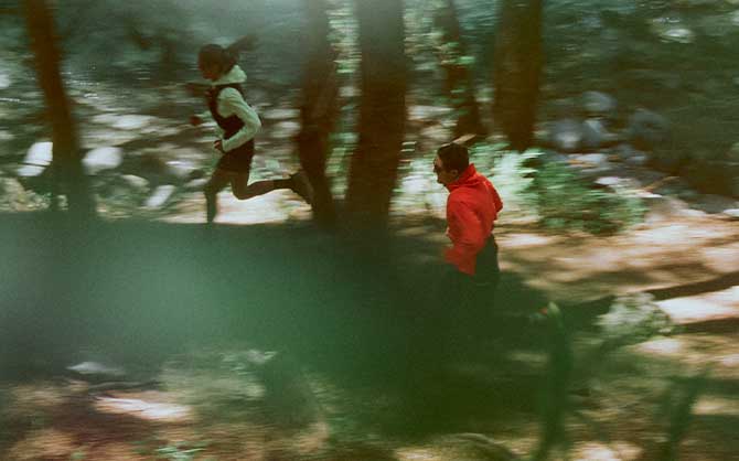 A lone runner in a forrest